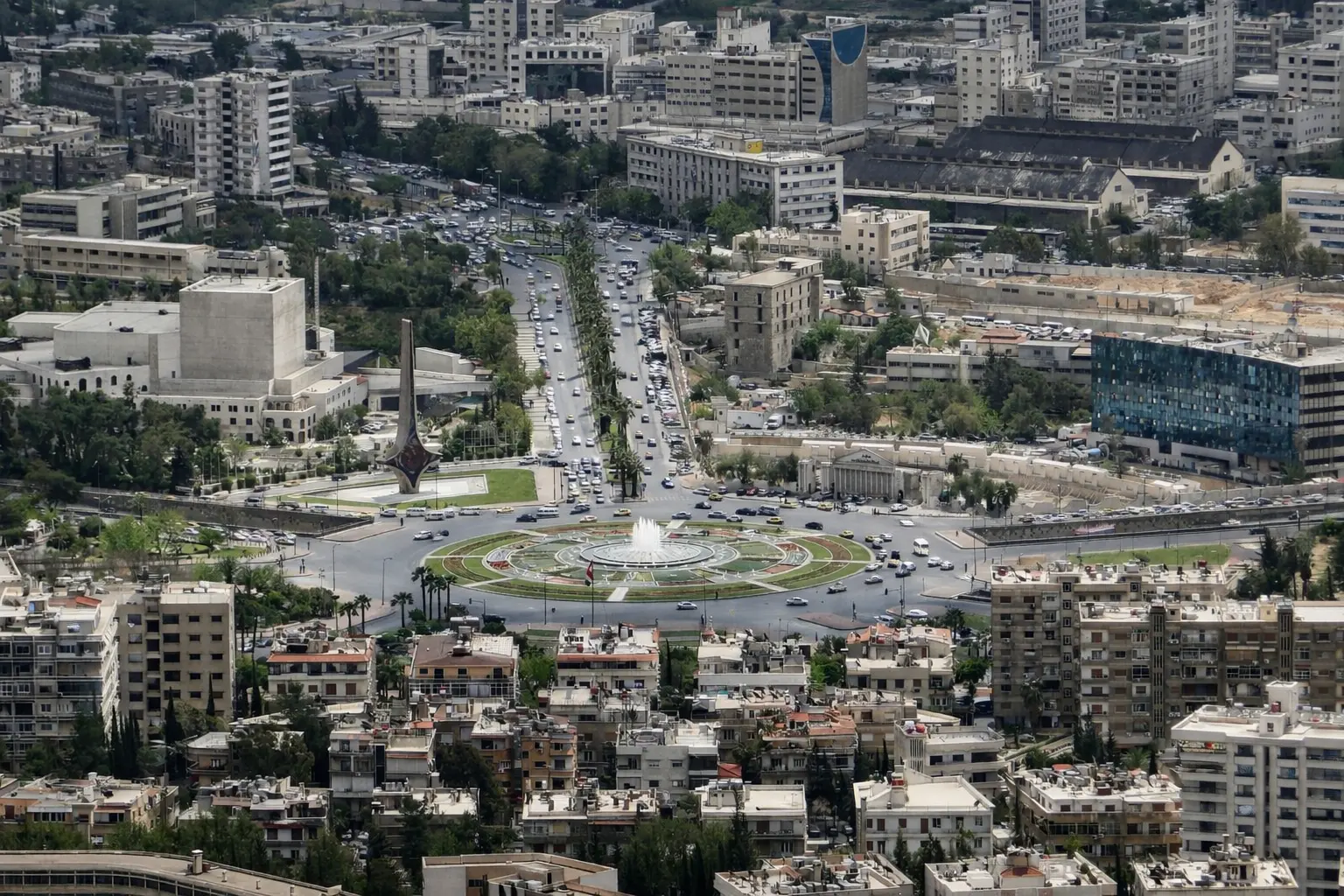 Damascus cityscape near Al Arabia Law office